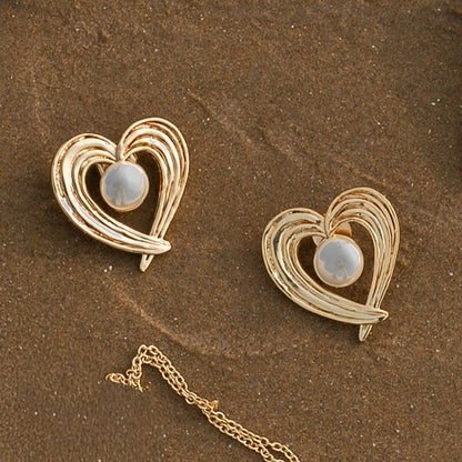 Hridaya Brass Pearl Stud Earrings