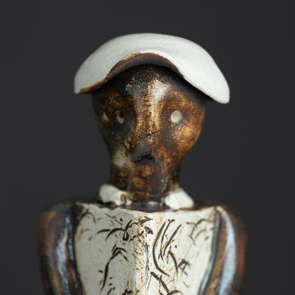 Contemplative Sentinel Ceramic Figurine