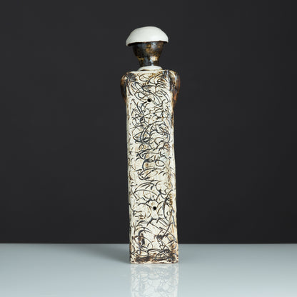 Contemplative Sentinel Ceramic Figurine