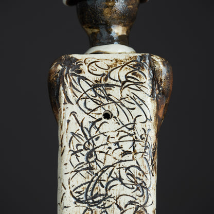 Contemplative Sentinel Ceramic Figurine